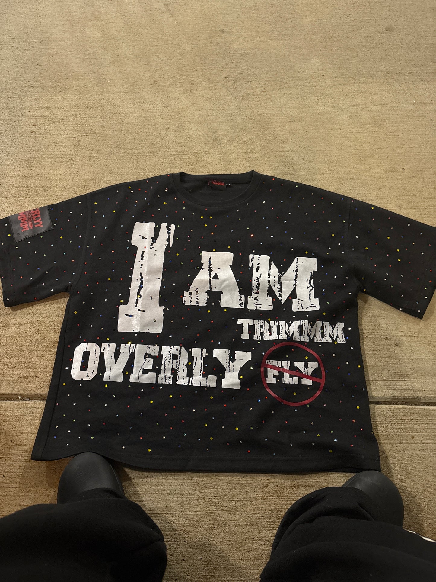 overlytrimmm black tee